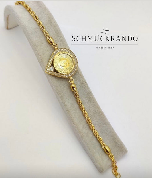 Kordelarmband mit 22k vergoldete Ceyrek Münze in Tropfenform mit Zirkonia Steinen