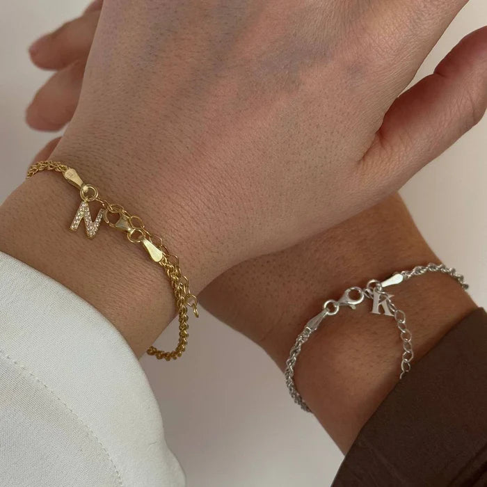 Kordel-Amband in 925er Silber als Paar Partnerarmband vergoldet mit Wunschbuchstabe